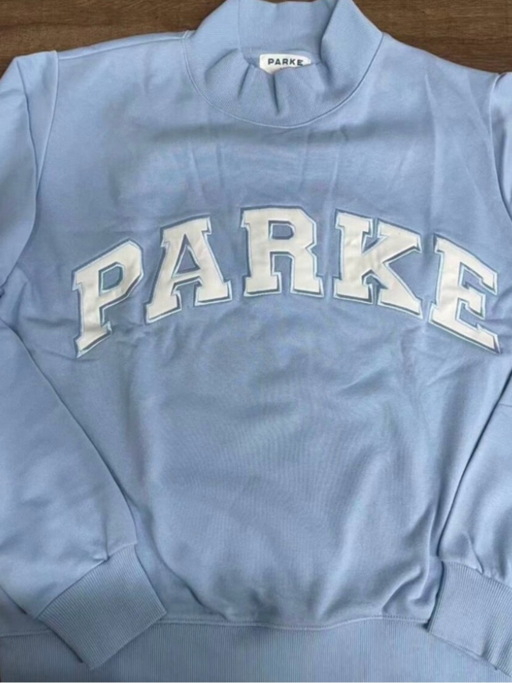 Parker Light Blue Mock Neck Sweatshirt with White Appliqué